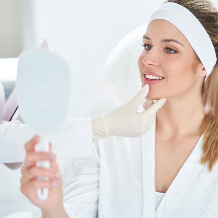 Patient receiving gummy smile treatment with Anti-Wrinkle Injection at London Dental Arts Clinic.